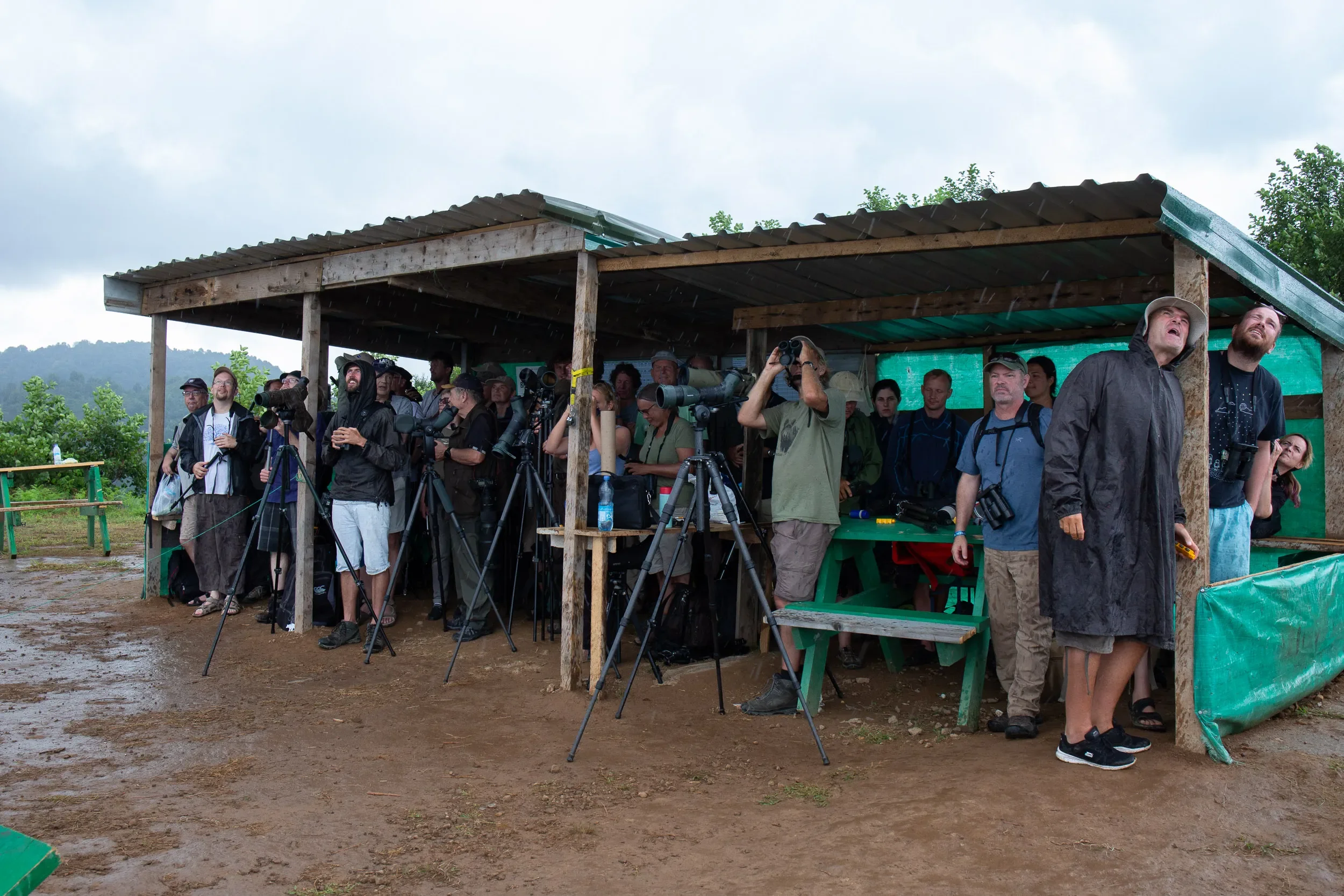 A renovated shelter full of counters and tourists, providing shelter from this season’s rare rain