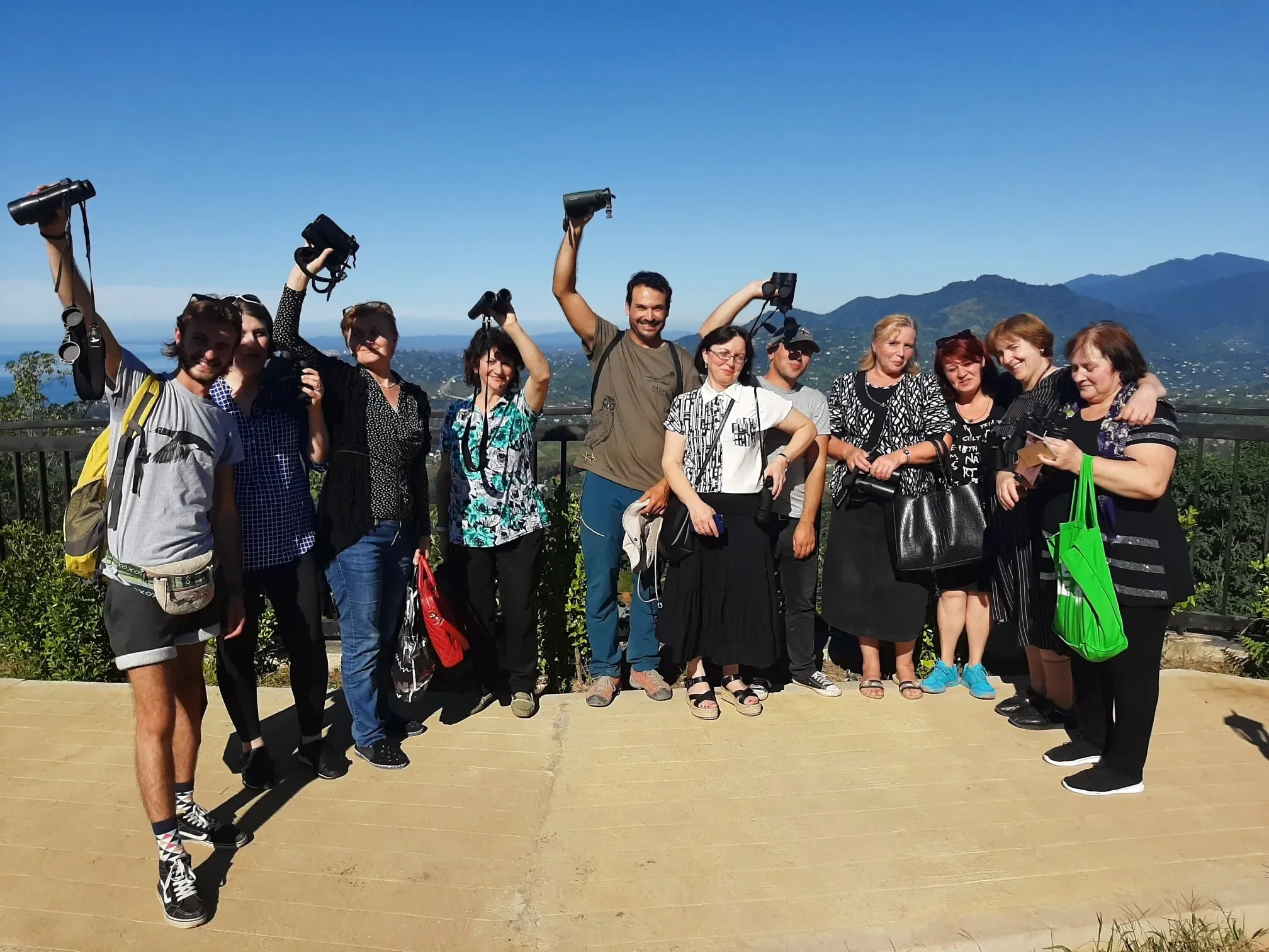 Teachers and conservationists visiting the new Sakhalvasho station