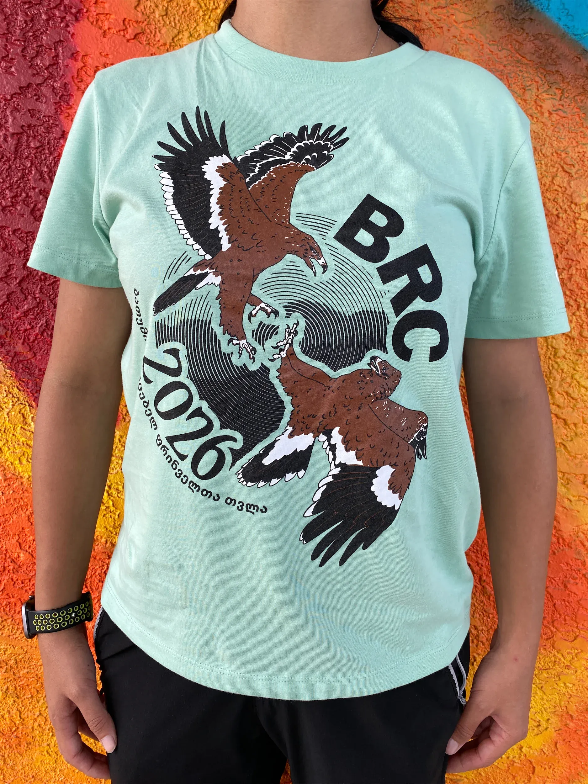 The 2026 BRC T-shirt featuring two squabbling juvenile Steppe Eagles