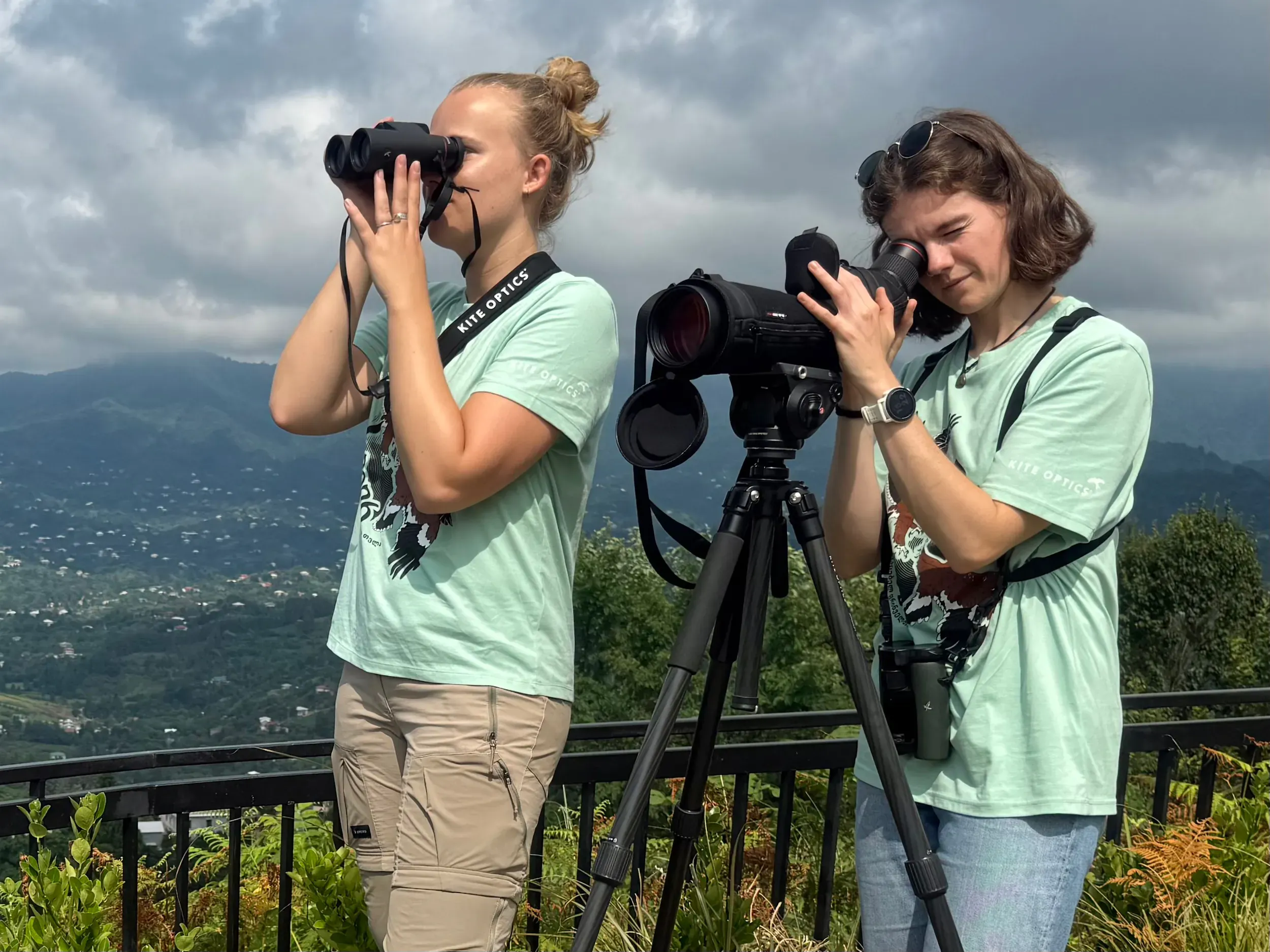 Two BRC coordinators using Kite Optics binoculars and a spotting scope at a count station