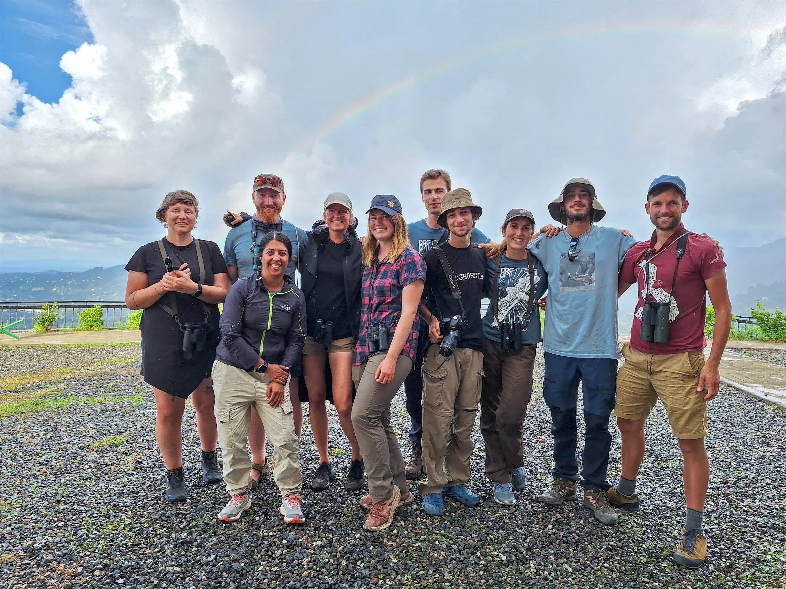 The station 1 team posing in front of one of many rainbows decorating the bottleneck