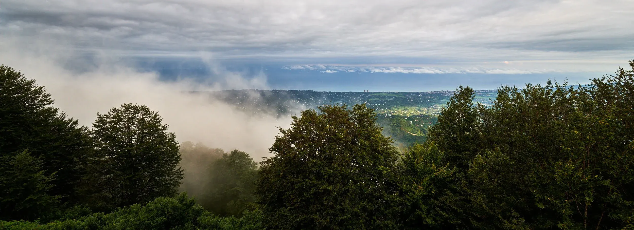 View from the balcony of Chalet Kvirike towards the west, with the Black Sea in the distance