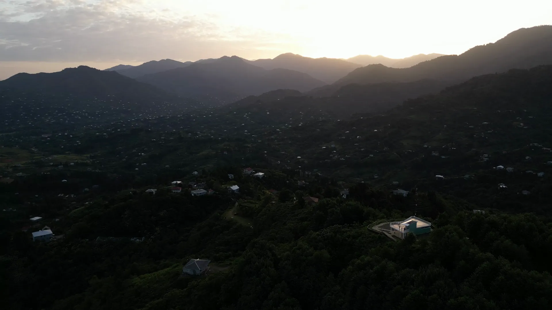 Aerial view over the forested hills of the Batumi bottleneck at station 1 around sunrise