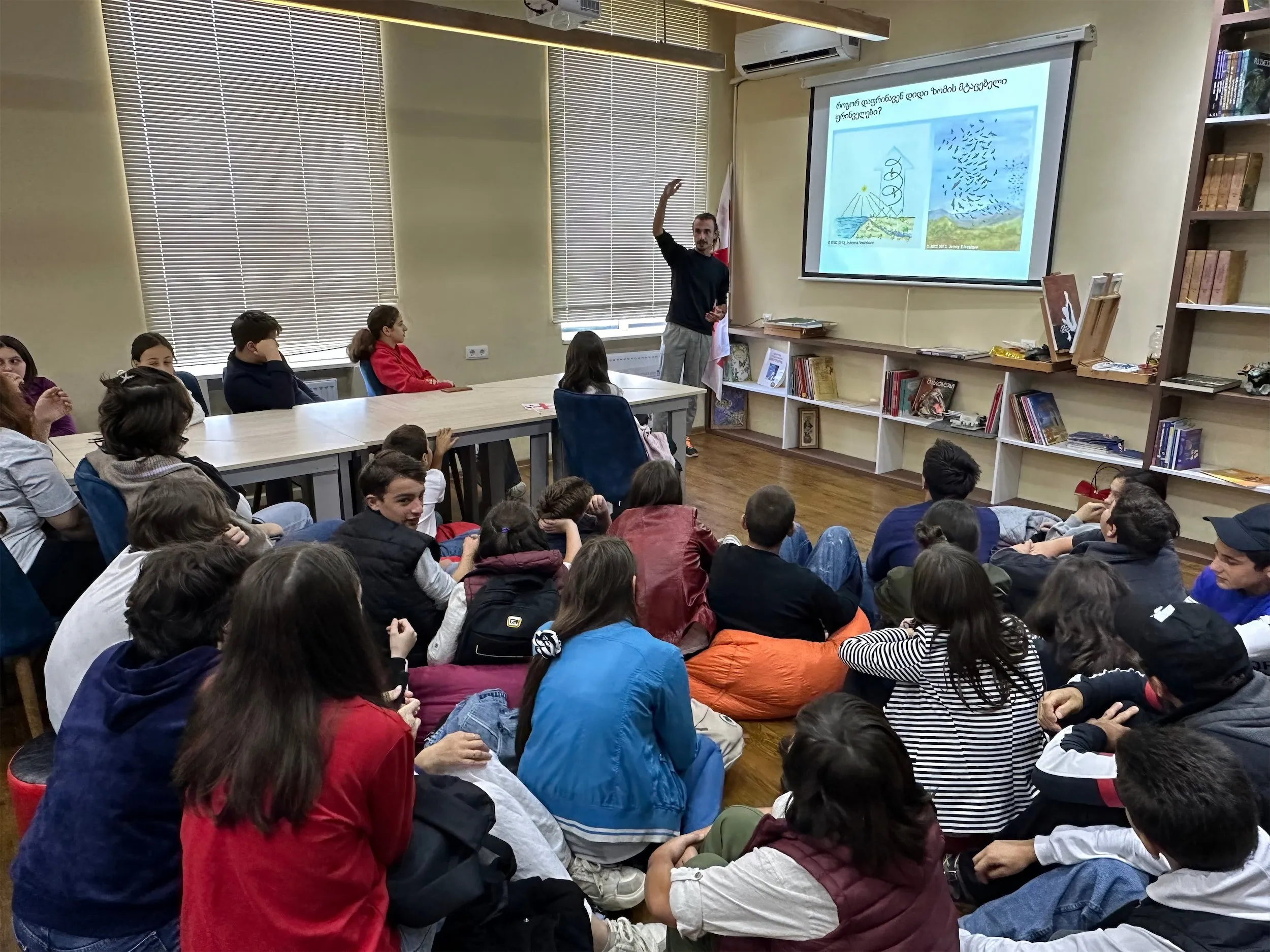 A BRC volunteer teaching local schoolchildren about raptor migration and conservation